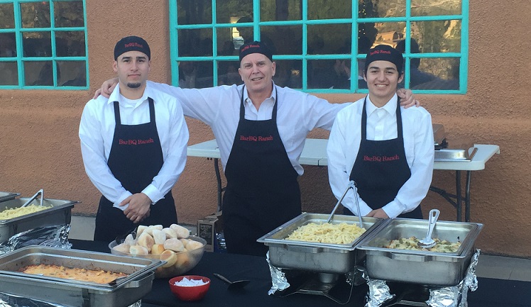 Bar-BQ Ranch team serving at an event